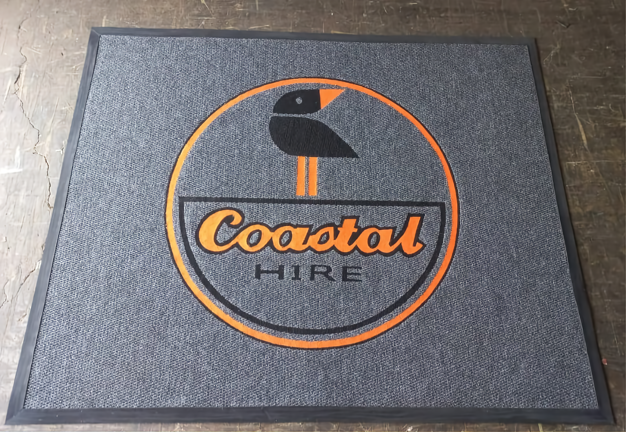 Logo entrance mat manufactured for a corporate office lobby