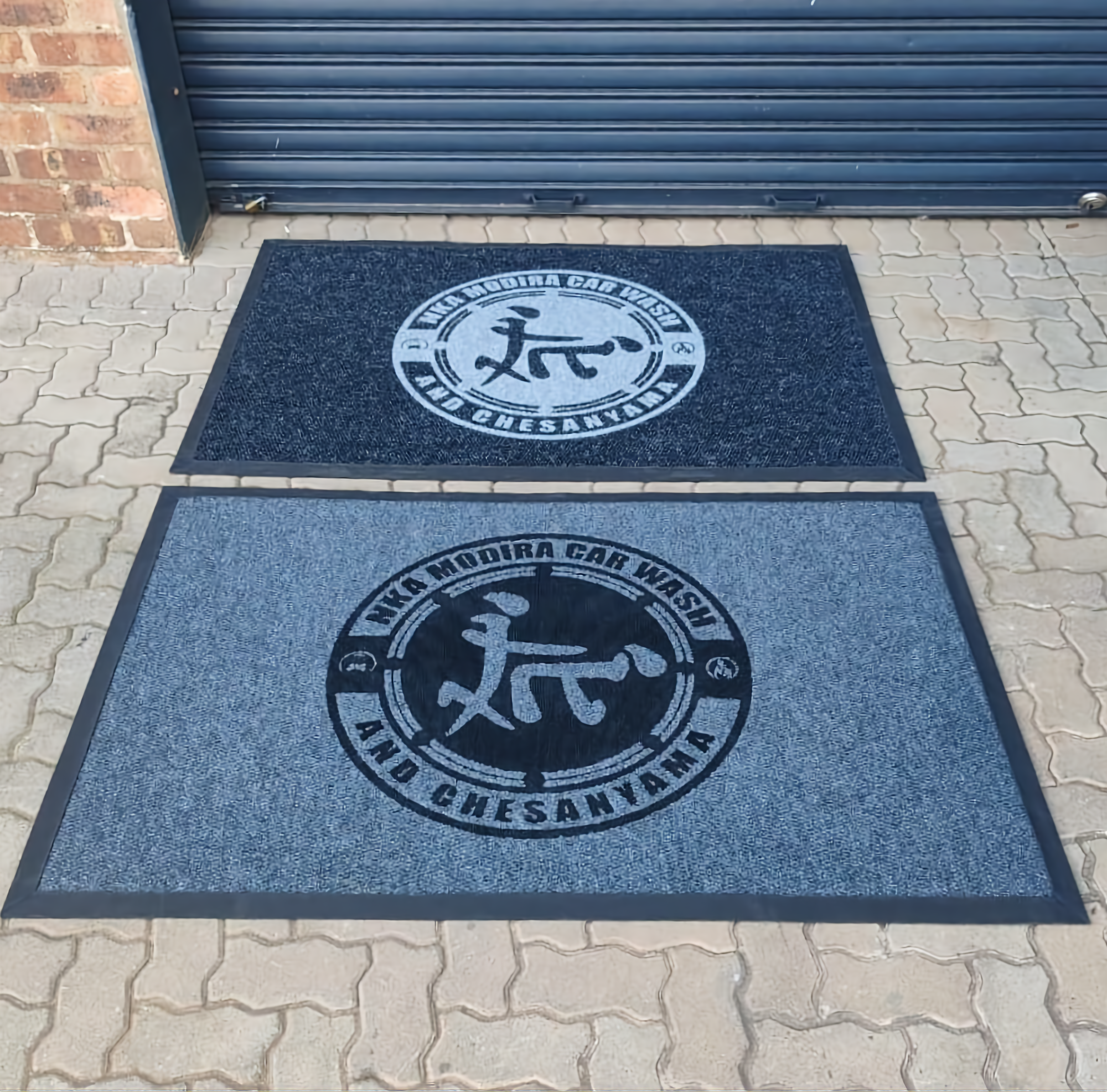 Custom branded entrance mat for a home entrance