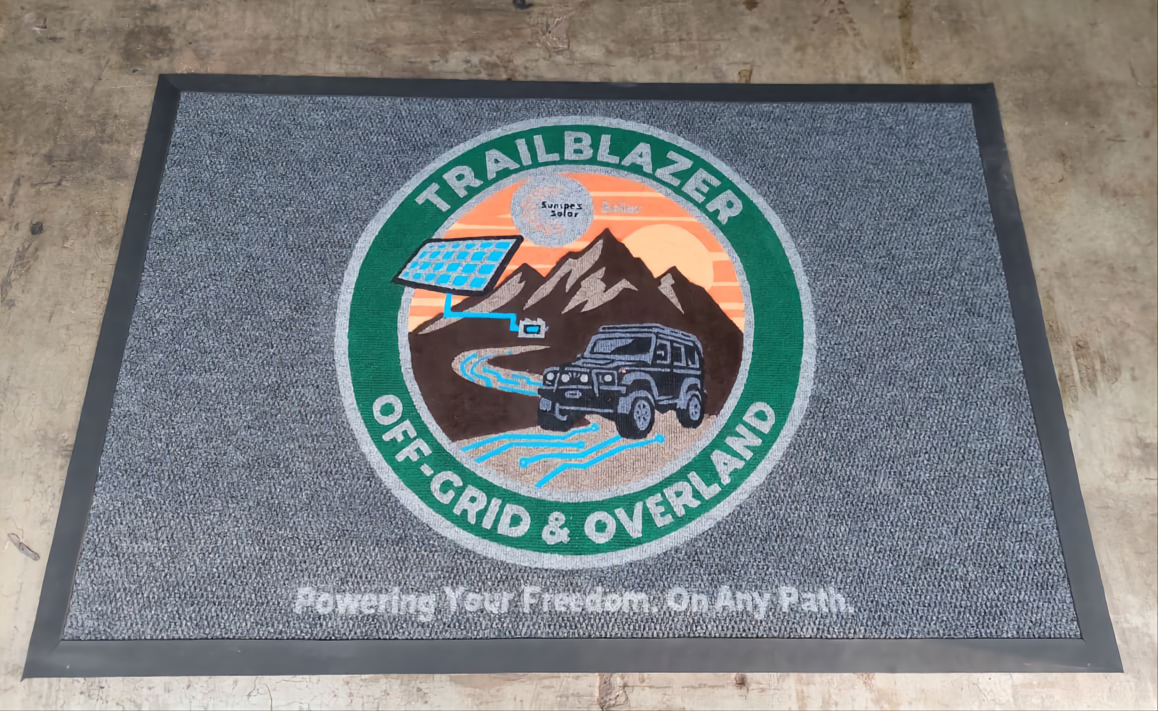 Custom branded entrance mat for a gym reception